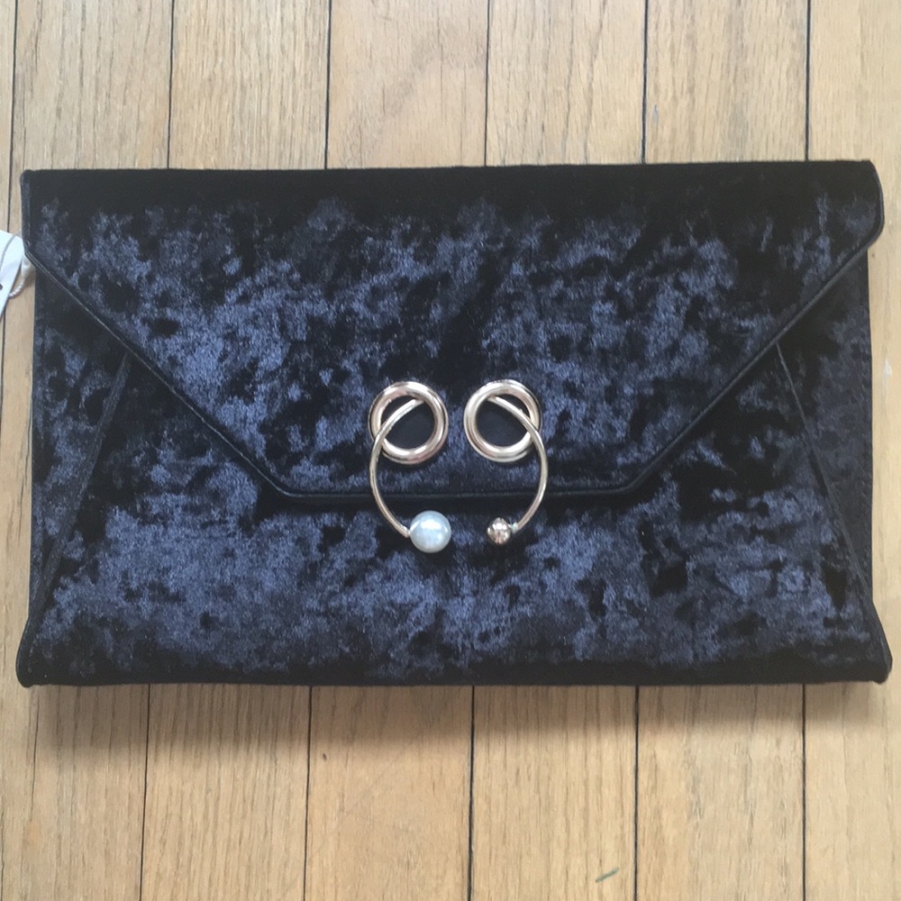 Primark velvet clutch. New with tags.